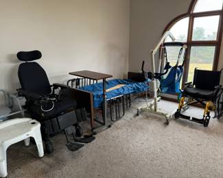 medical equipment, hospital bed, hoist, shower seat table tray