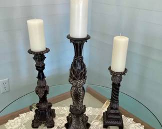 Ornate carved candleholder set