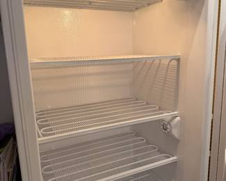 Heavy-duty Imperial freezer with adjustable shelves, door storage, and quick-freeze feature.