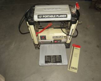 Lot 221. Pro-Tech Contractor Series 13" portable planer with an extra set of blades