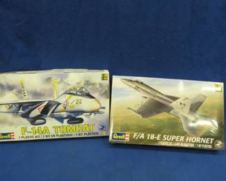 Lot 498. Two Revell model fighter Jets: F-14A Tomcat, the box is open and the parts are sealed. F/A 18-E Super Hornet sealed box.
