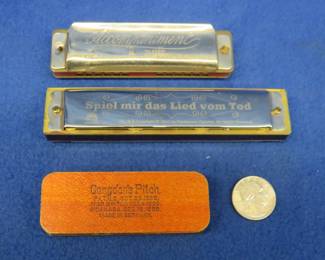 Lot 356. Spiel mir das Lied vom Tod (Loss and Betrayal) 32-hole diatonic harmonica by an unknown maker based on the movie "Once Upon a Time in the West".  Unknown maker Accompaniment 12-hole double divided harmonica in the key of G. Sounds great. London's Pitch Pipe.