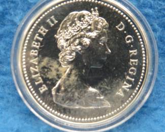 Lot 97. 1975 Canadian silver dollar commemorating the Calgary Stampede
