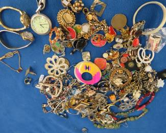 Lot 428. Costume jewelry, watches, cuff links, and more
