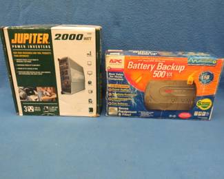 Lot 67. Jupiter 2000-watt power inverter and an APC battery backup system. Both are new in the box.