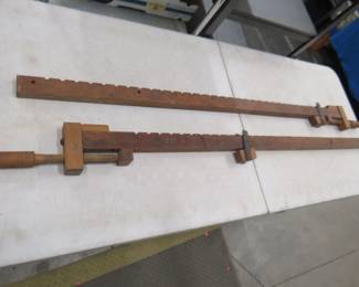 Lot 438. Vintage wooden clamps. Working length of 53".