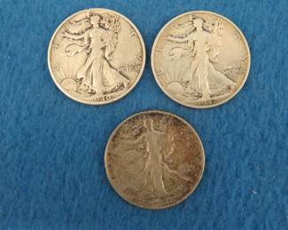 Lot 94. Three Walking Liberty half dollars. 1940 P (2), and a 1942 D.