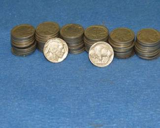 Lot 320. 67 Buffalo nickels. Dates are readable with magnification.