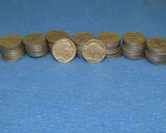 Lot 321. 67 Buffalo nickels. Dates are readable with magnification.