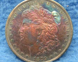 Lot 277. 1879 S Morgan silver dollar with toning