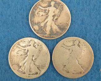 Lot 272. Three Walking Liberty half dollars. 1937 P, 1942 P, and no date.
