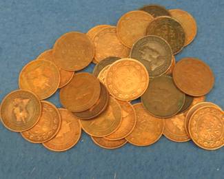 Lot 469. 31 Canadian pennies. Dates range from 1902 to 1910.