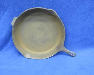 Lot 385. Vintage cast iron13 1/2" Wagner skillet with pour spouts and helper handle