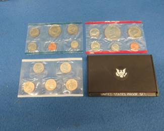 Lot 296. Four coin sets: 1978 S Proof Set. 1976 D Bicentennial US Mint Set. 1979 P US Mint Set. 2004 P State Quarter Set.