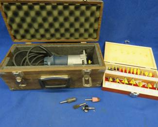 Lot 79. Bosch router and a router bit set