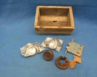 Lot 127. Chrome cabinet handles, old wood box, and more