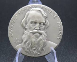 Lot 345. Medallion weighing 1.831 troy ounces of .999 pure silver from The Hall of Fame for Great Americans Series featuring Samuel Finley Breese Morse. Made by the New York Medallic Art Co.
