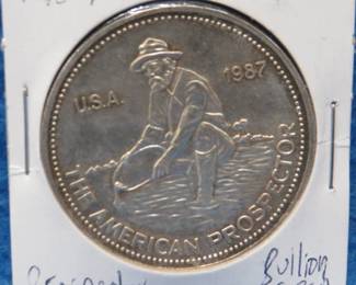 Lot 239. 1987 Engelhard "The American Prospector" silver round. One ounce of .999 fine silver.