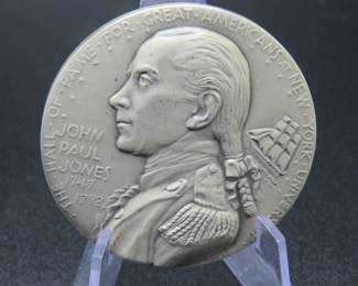 Lot 340. Medallion weighing 2.462 troy ounces of .999 pure silver from The Hall of Fame for Great Americans Series featuring John Paul Jones. Made by the New York Medallic Art Co.