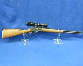 Lot 9. Marlin Model: 336, S/N: AB30312, 44-Mag lever-action rifle with a leather sling and hard case. The gun is in fair to good condition with pitting and some rust.