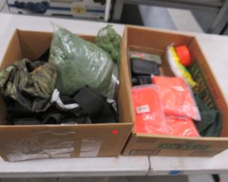 Lot 337. Hunting supplies including binoculars, a whet stone, mosquito netting and more