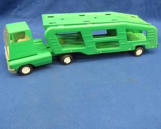Lot 390. Vintage Tonka car hauler that appears to have been repainted