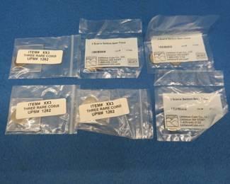 Lot 319. Six packets of coins from the Littleton Coin Co. each containing an Indian Head penny, Liberty nickel, and a Buffalo nickel.