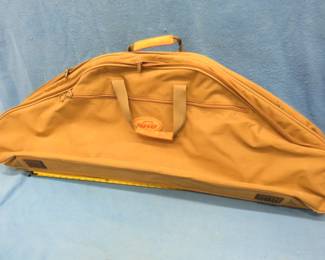 Lot 411. Double-sided SKB canvas bow case with two child-size bows