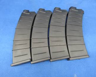 Lot 180. Four 12-gauge magazines, not marked for type of shotgun