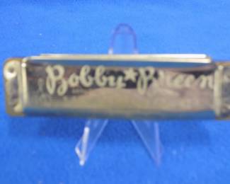Lot 119. Bobby Breen 4" diatonic harmonica in the key of C. Low notes need tuning. Made in Czechoslovakia. 