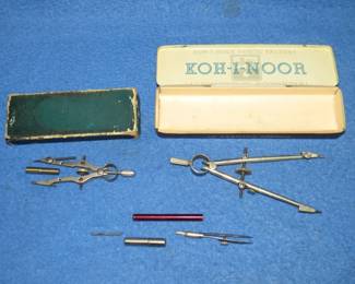 Lot 451. Two compasses and an old metal pencil box.