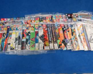 Lot 291. 75 comic books. Mostly DC and Marvel in like-new condition.