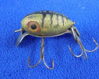 Lot 217. Vintage Fred Arbogast 1 1/2" plastic Hula Dancer