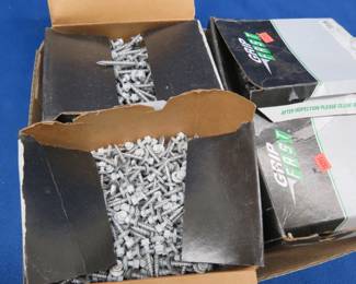 Lot 209. Four open boxes of 1" & 2" Pole Barn screws