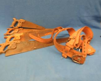Lot 90. Leather safety belt and four saws