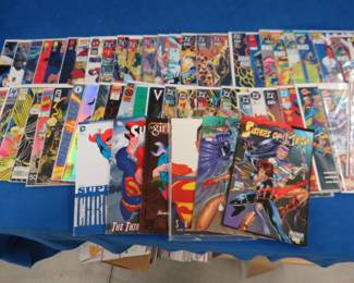 Lot 294. 56 comic books. Most are bagged and boarded in like-new condition