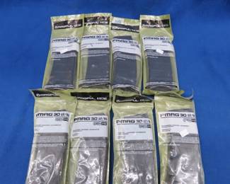 Lot 105. Eight Magpul 30-round 5.56 magazines