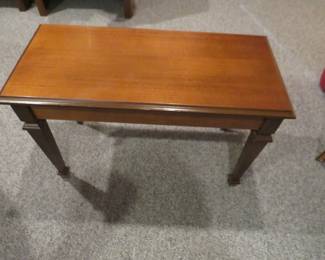 Lot 490. Piano bench with music