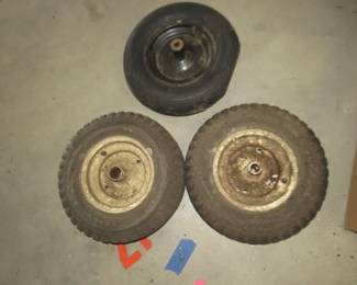 Lot 434. Three utility wheels on rims. All are 4.8-4.0 x 8".