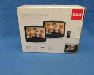 Lot 23. RCA mobile DVD system. Keep the kids quiet on those road trips. Works great with controls on the screen. No remote controller.
