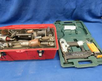 Lot 128. Pneumatic Hitachi brad nailer and a hole saw assortment