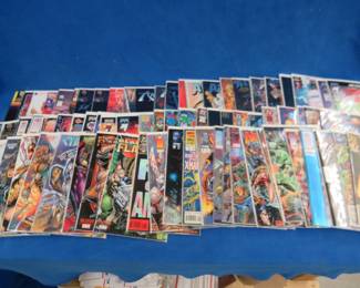 Lot 293. 75 bagged and boarded comic books in like-new condition.