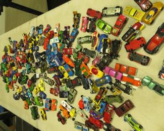 Lot 421. Matchbox and Hot Wheels cars and case