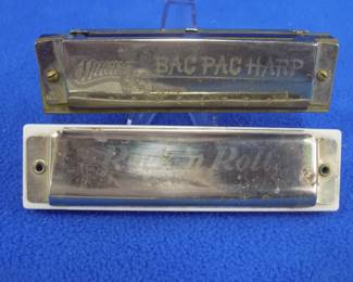 Lot 117. Auburn Rubber Co. Inc. Rock N' Roll tremolo harmonica. Sounds great. Huang Harmonica, Inc BacPac Harp. Made in China