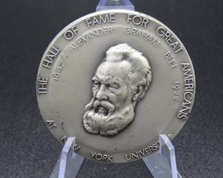 Lot 344. Medallion weighing 1.921 troy ounces of .999 pure silver from The Hall of Fame for Great Americans Series featuring Alexander Graham Bell. Made by the New York Medallic Art Co.