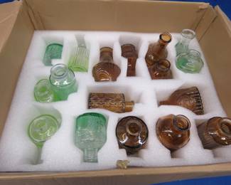 Lot 252. 17 glass bottles in different shapes and patterns, the box says they are 250ml