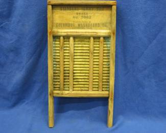 Lot 443. Brass washboard made by the Columbus Washboard Co.