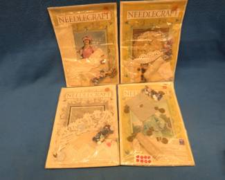 Lot 137. Early 1900s Needlecraft magazines wrapped and packed with other collectibles including buttons, lace, S&H stamp books, and misc. ephemera