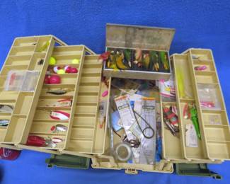 Lot 331. Plano 8606 and Umco #10 fishing tackle boxes with a mixture of older and newer fishing baits and tackle