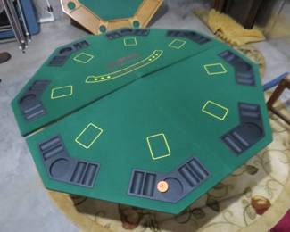 Lot 494. Poker table top that folds into quarters. Includes a carrying case.